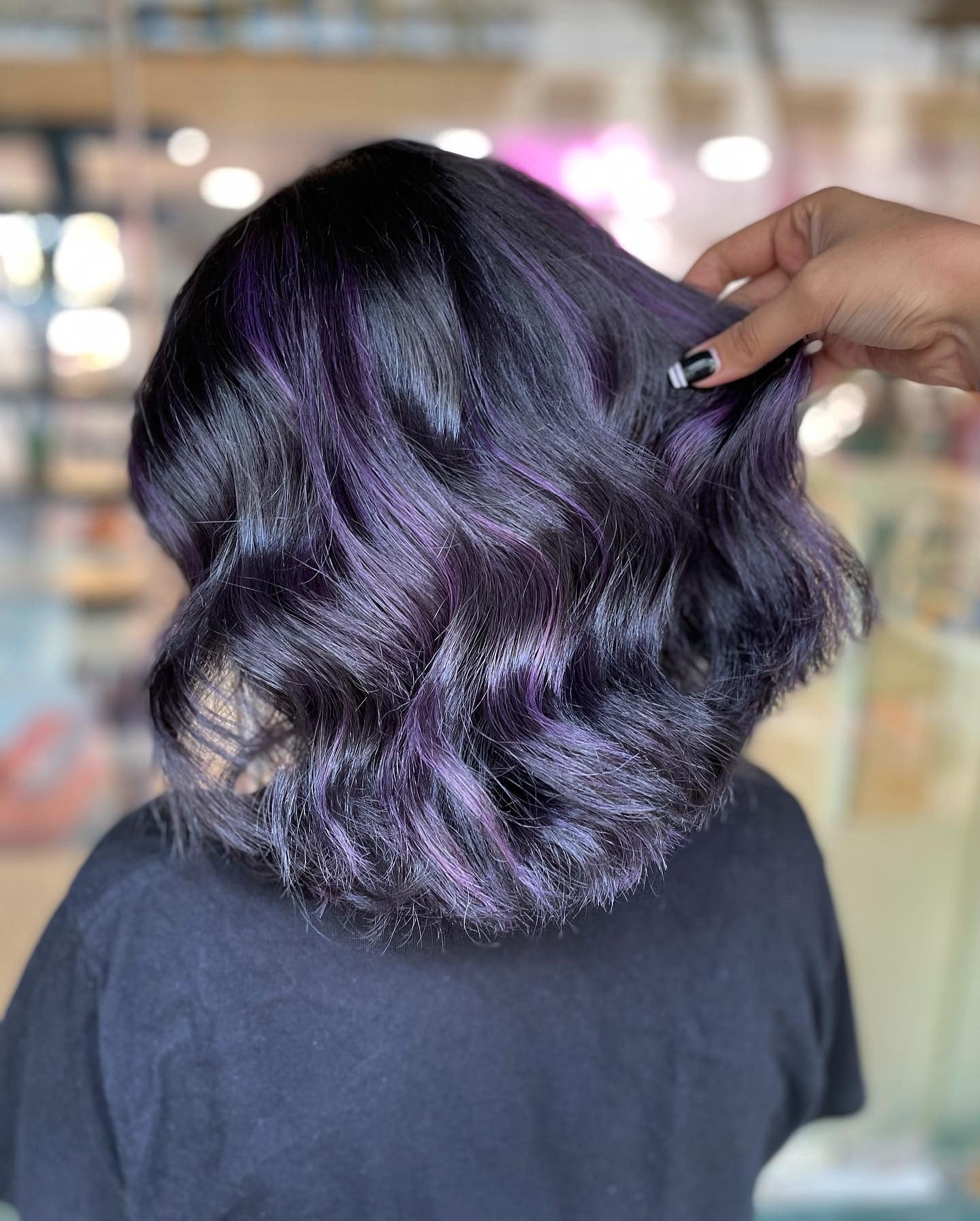 6. Midnight Black with Violet Accents (Short Wavy Hairstyles)