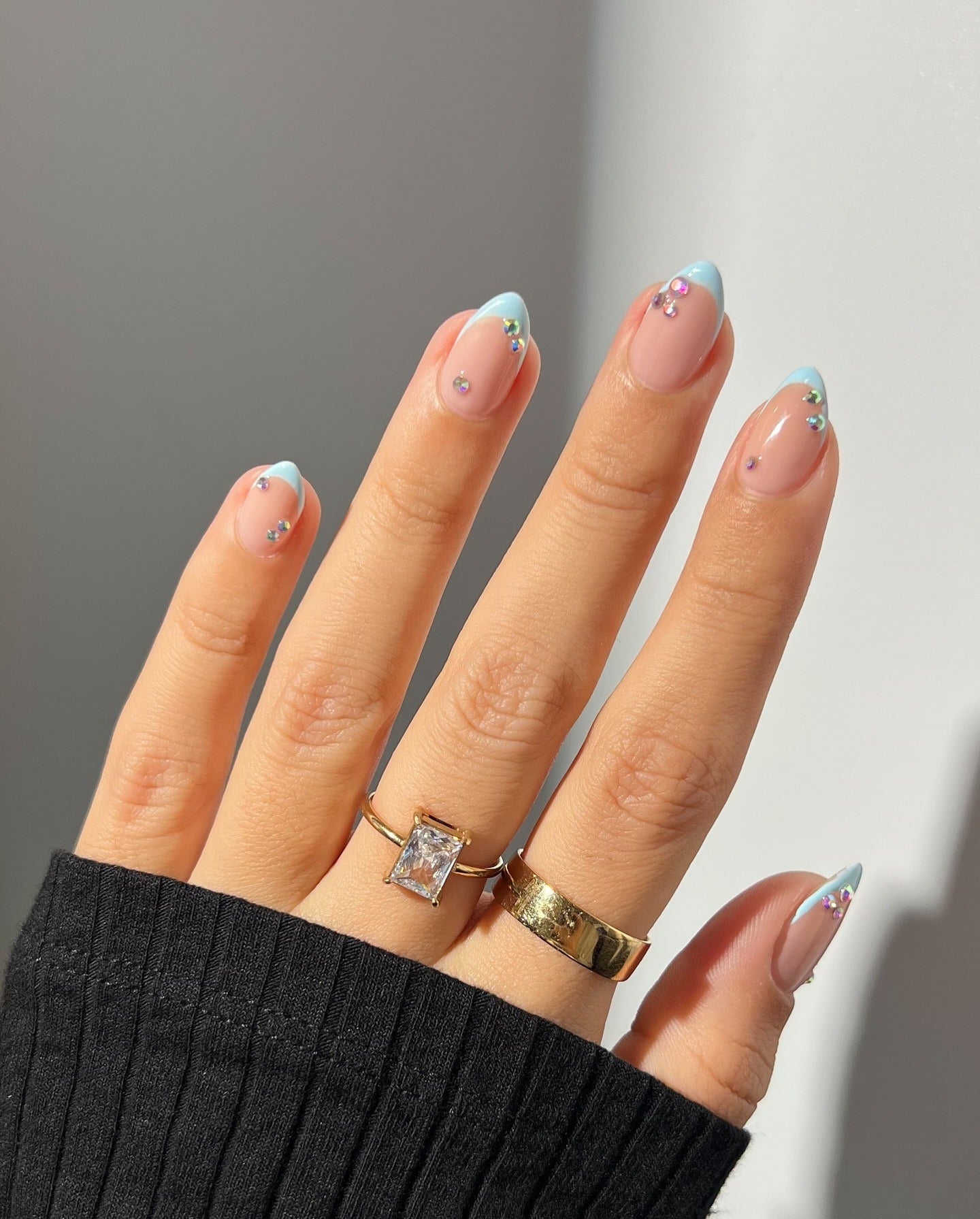 13. Icy Blue French Tips with Sparkle Studs (Short Winter Nail Ideas)