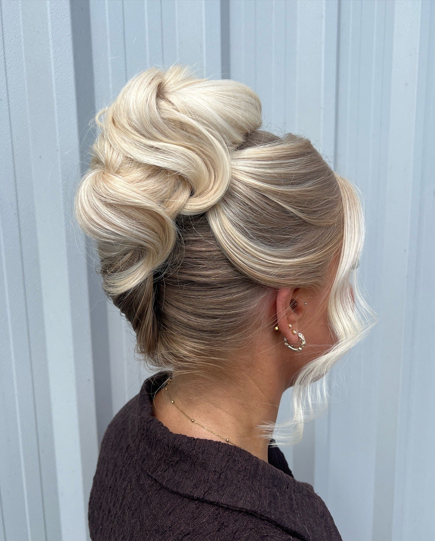 4. Sculpted Blonde French Roll (Spring Hairstyles)