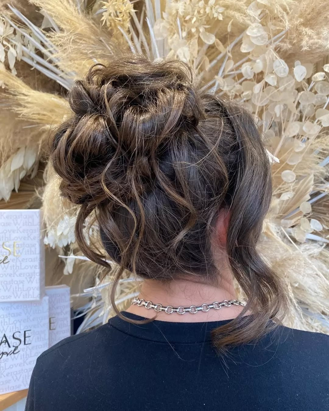 10. Textured Updo with Soft Tendrils (Spring Hairstyles)