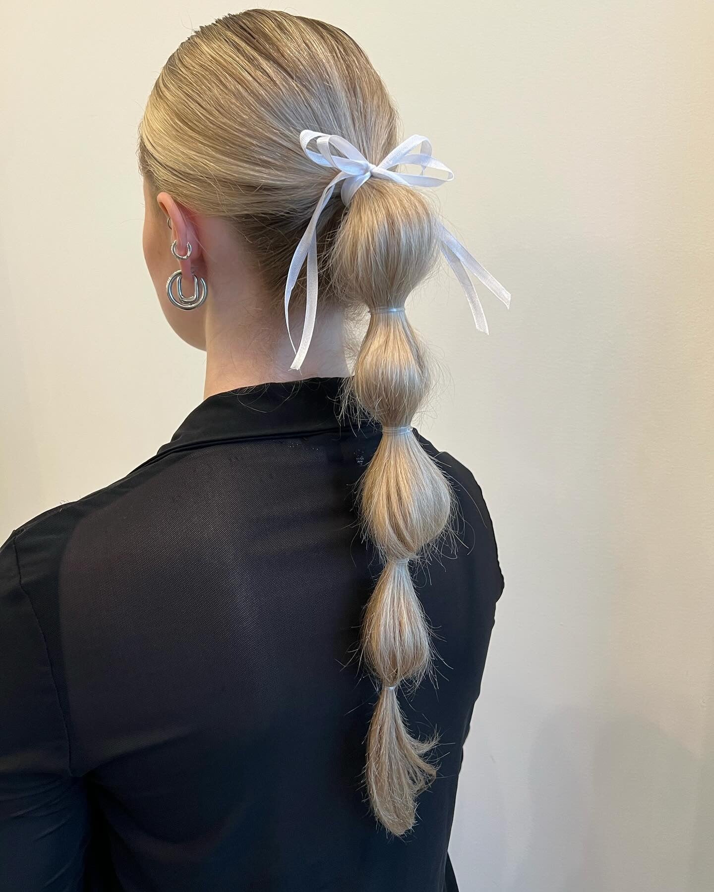 11. Bubble Ponytail with Ribbon Detail (Spring Hairstyles)