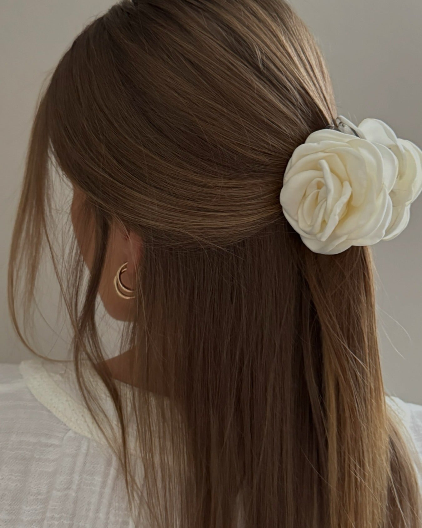 12. Minimal Half-Up with Floral Clip on Medium Chestnut Brown (Spring Hairstyles)