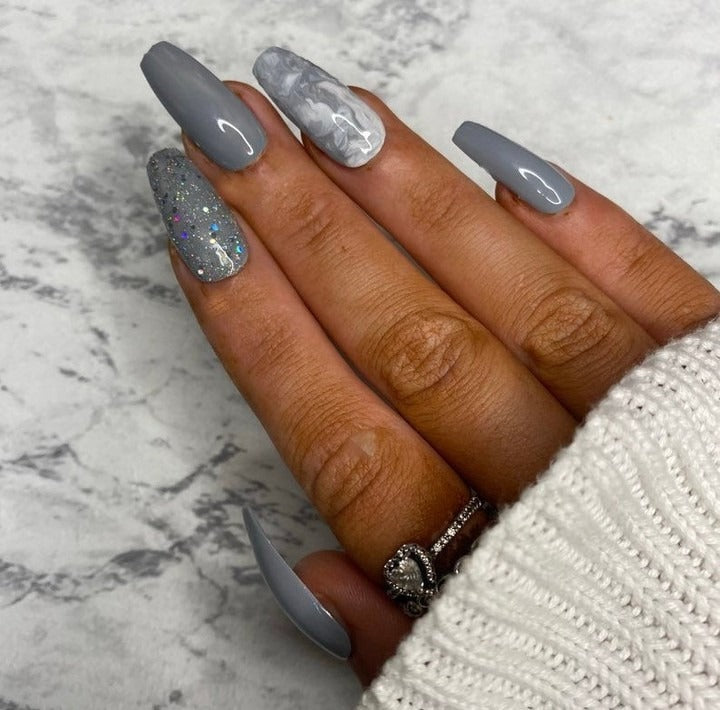 2. Glossy Marble and Grey Accent Nails (Grey Coffin Nail Ideas)