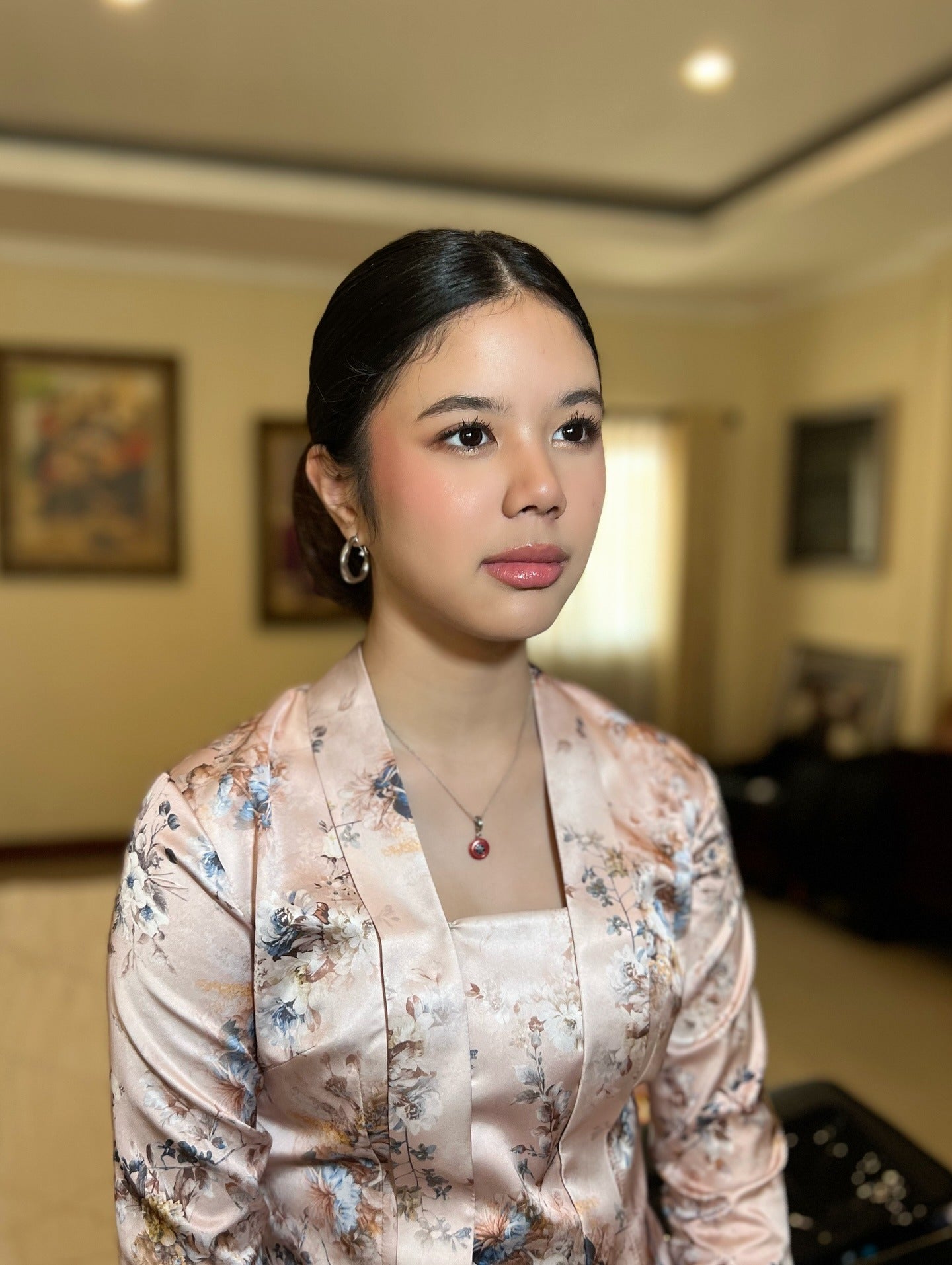 1. Elegant Low Bun with Glossy Black Hair (Slick Back Hairstyles)