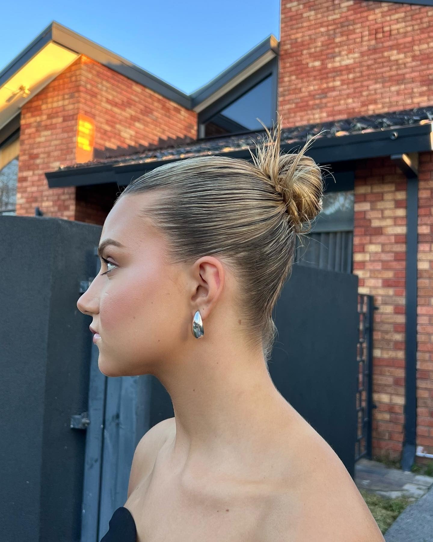 9. Sleek Knot with Honey Blonde Finish (Slick Back Hairstyles)