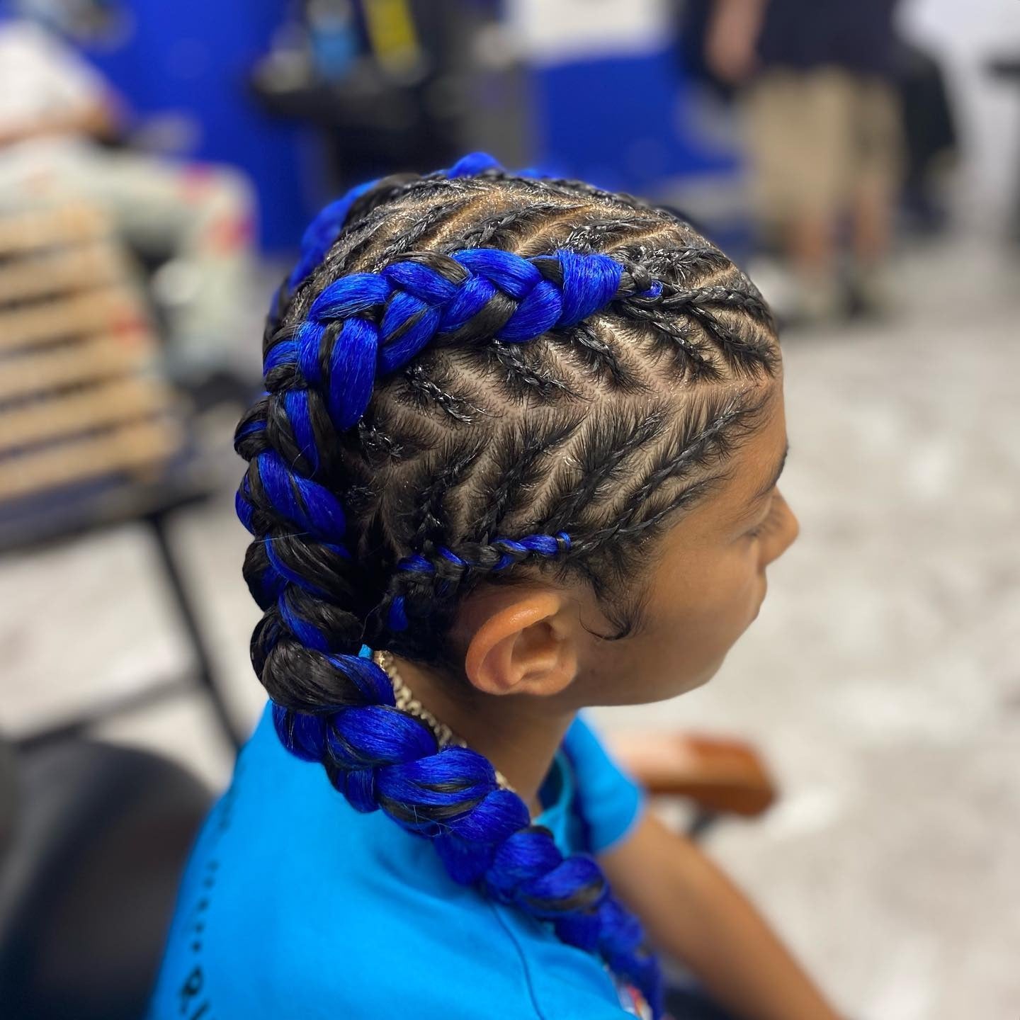 3. Cornrow Braids with Electric Blue Extensions (Softball Hairstyles)