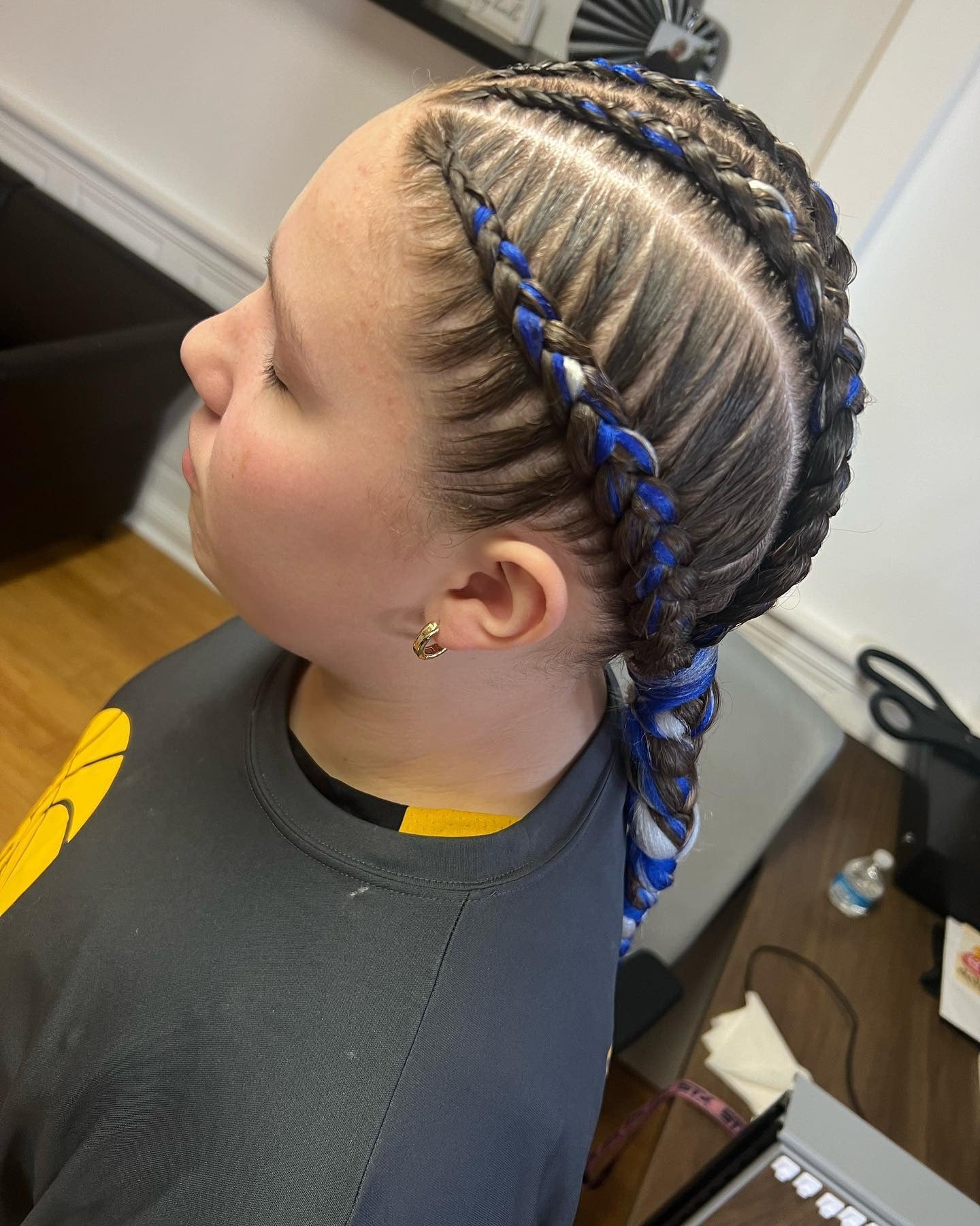 12. Feed-In Cornrows with Blue Highlights (Softball Hairstyles)