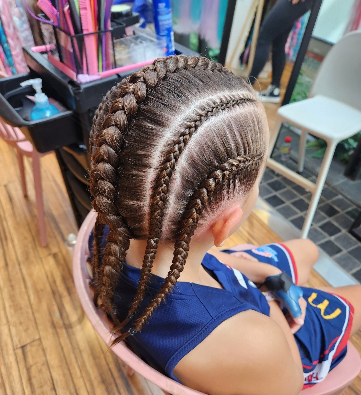 2. Multi-Row Cornrow Braids on Chestnut Brown (Volleyball Hairstyles)