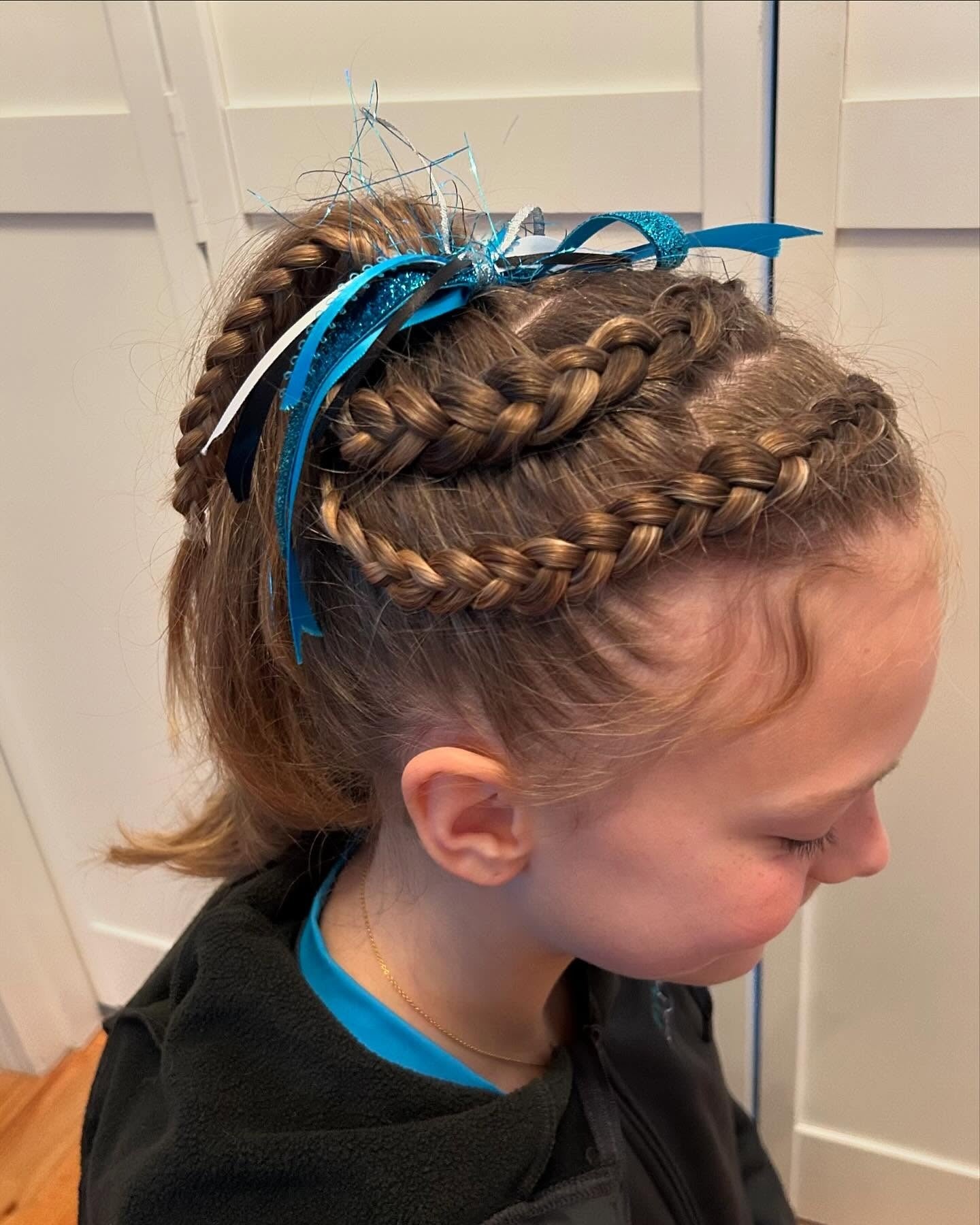 6. Braided Ponytail with Ribbons on Light Brown Hair (Volleyball Hairstyles)