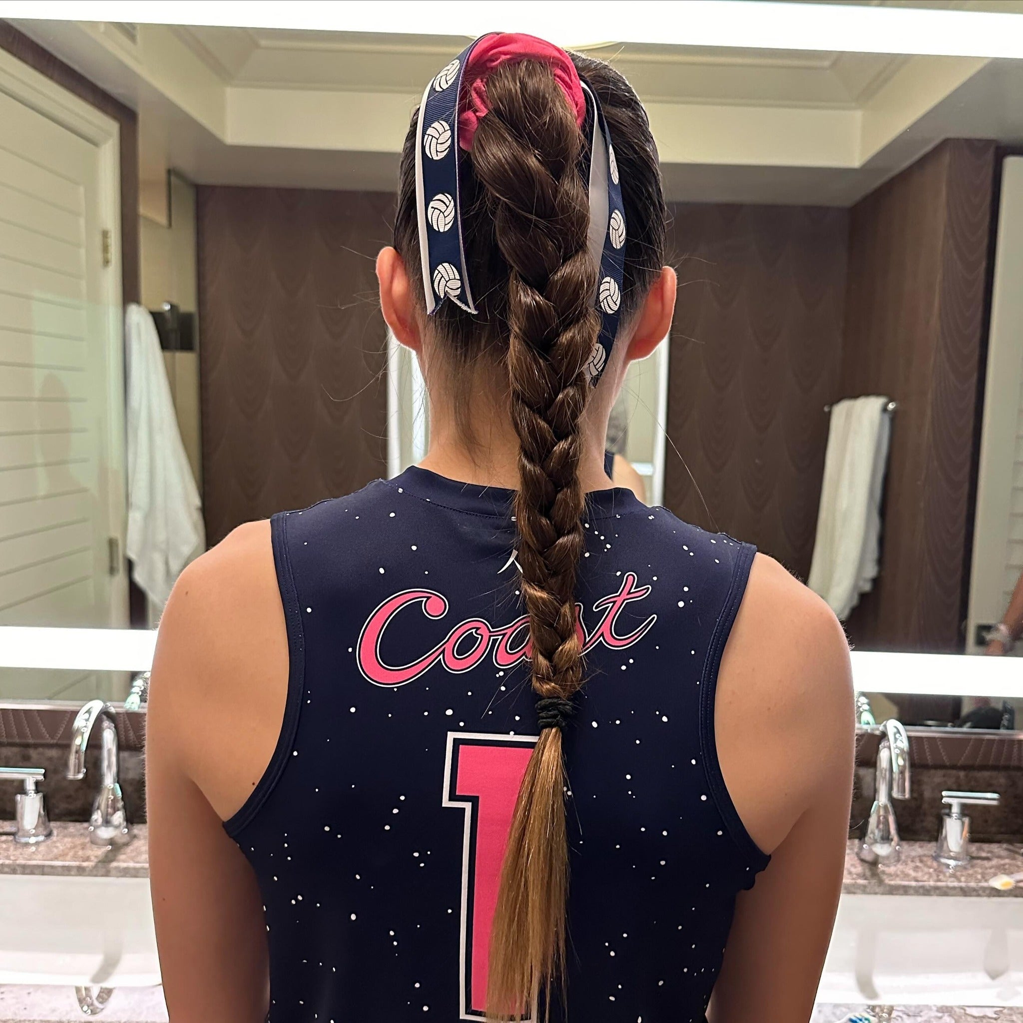 11. High Braided Ponytail with Volleyball Ribbon on Brunette (Volleyball Hairstyles)