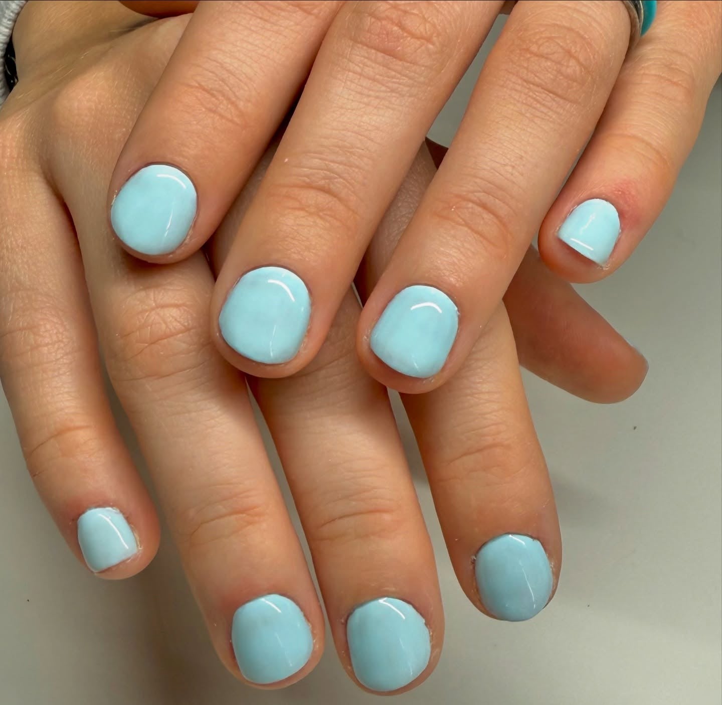 9. Sky Blue Round Refresh (Solid Nail Color Ideas)