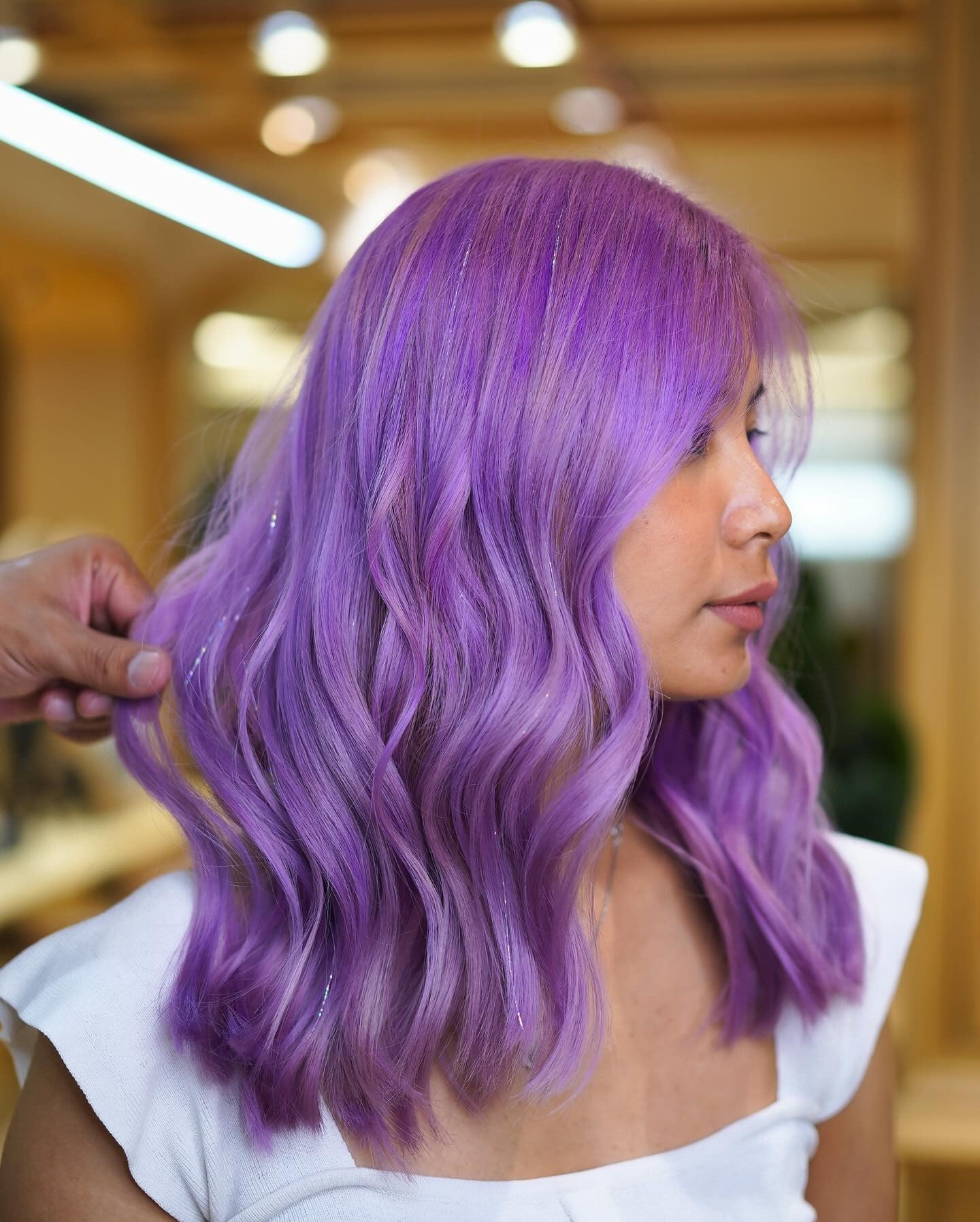 10. Shimmering Orchid Waves (Light Purple Hair Color)