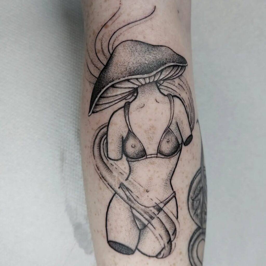 Unusual Woman Mushroom Tattoo