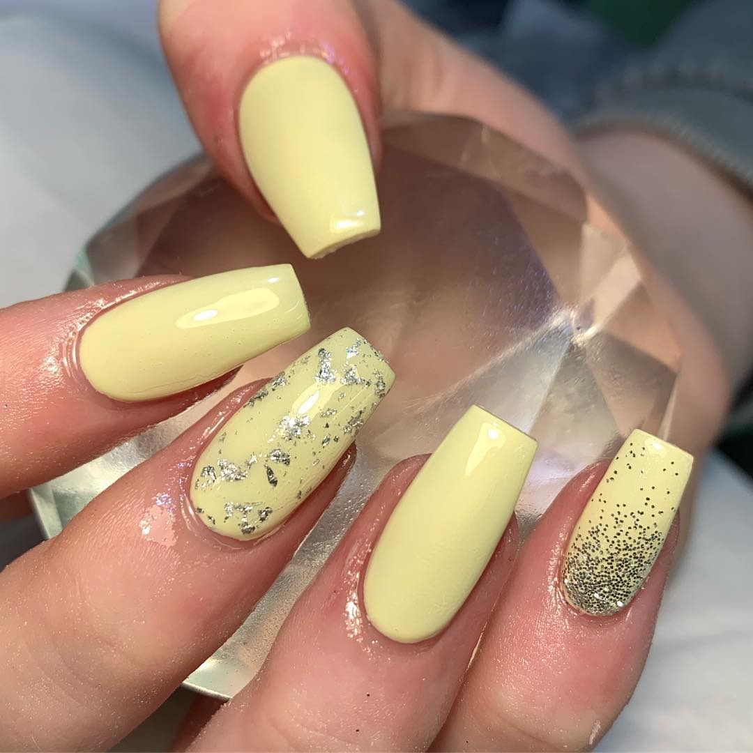4. Soft Lemon Yellow Nails with Metallic Accents (Yellow Coffin Nail Ideas)