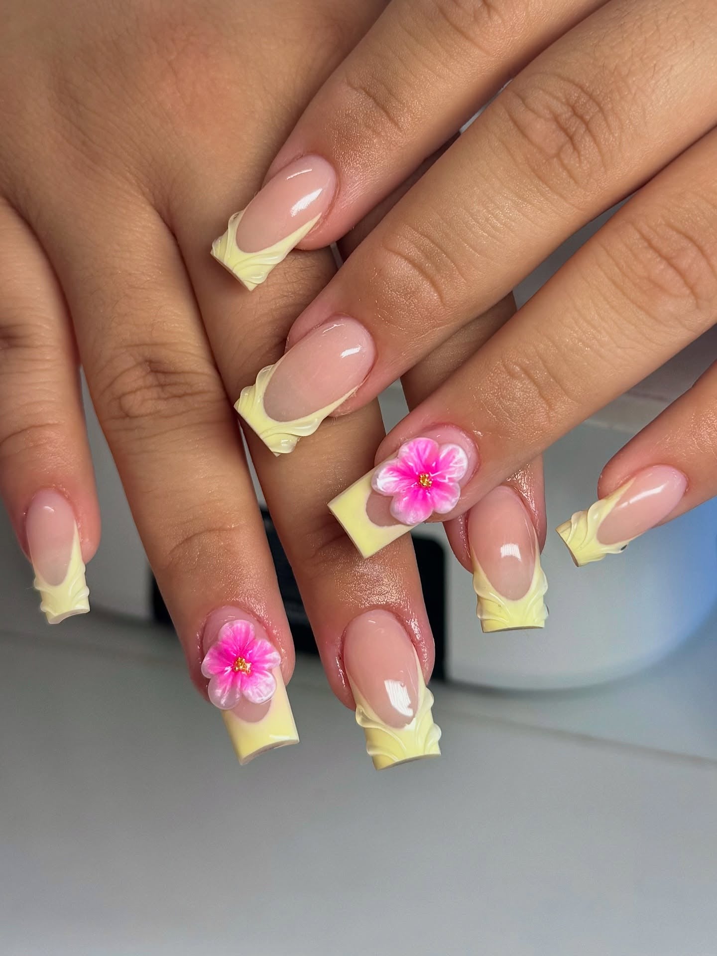 10. Yellow Coffin Nails with Layered Flowers and Gems (Yellow Coffin Nail Ideas)