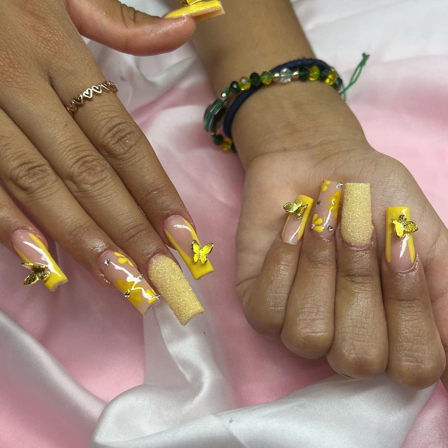11. Golden Butterfly Yellow Coffin Nails with Sugar Accent (Yellow Coffin Nail Ideas)