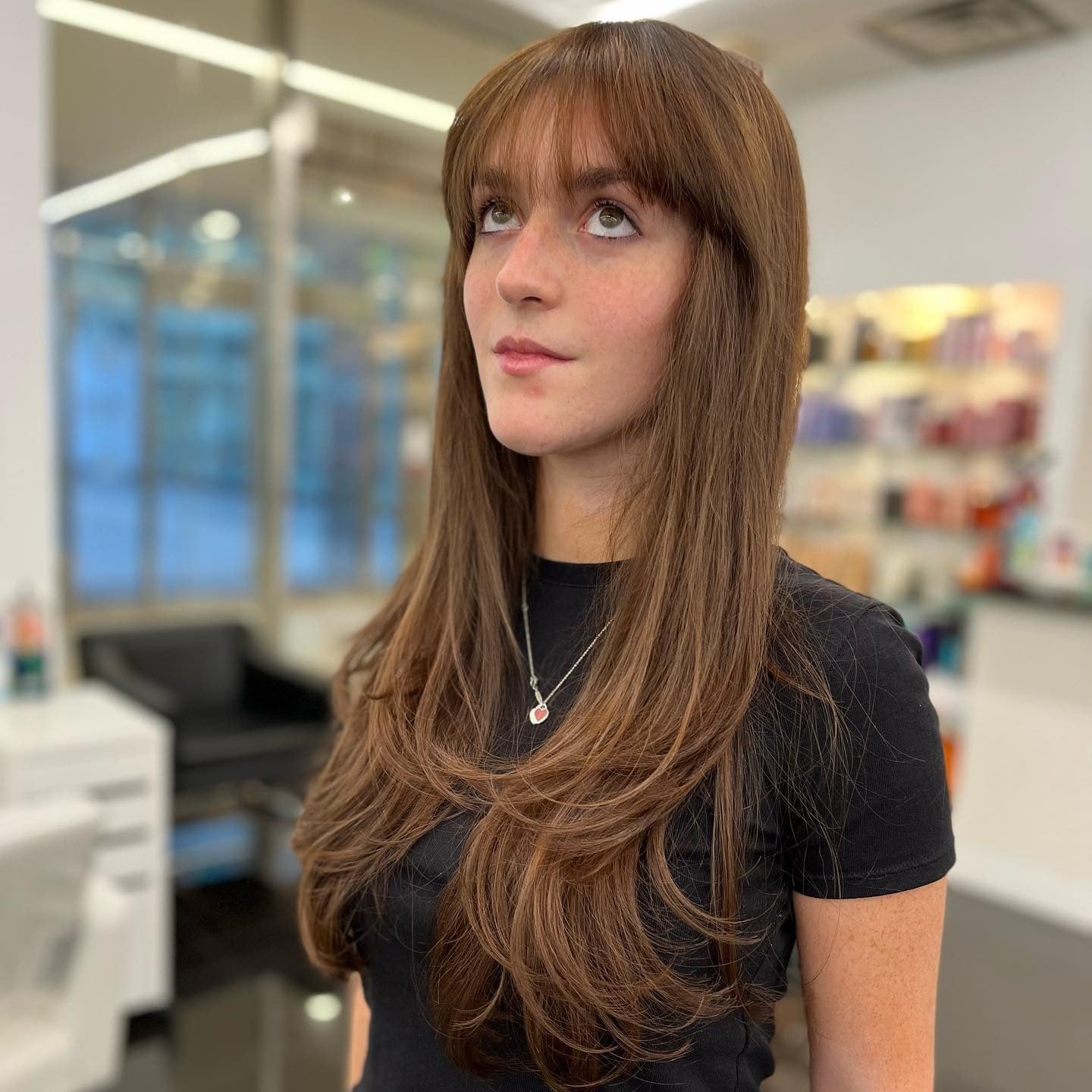 3. Long Layers with Eyelash Bangs (Bangs Hairstyles)