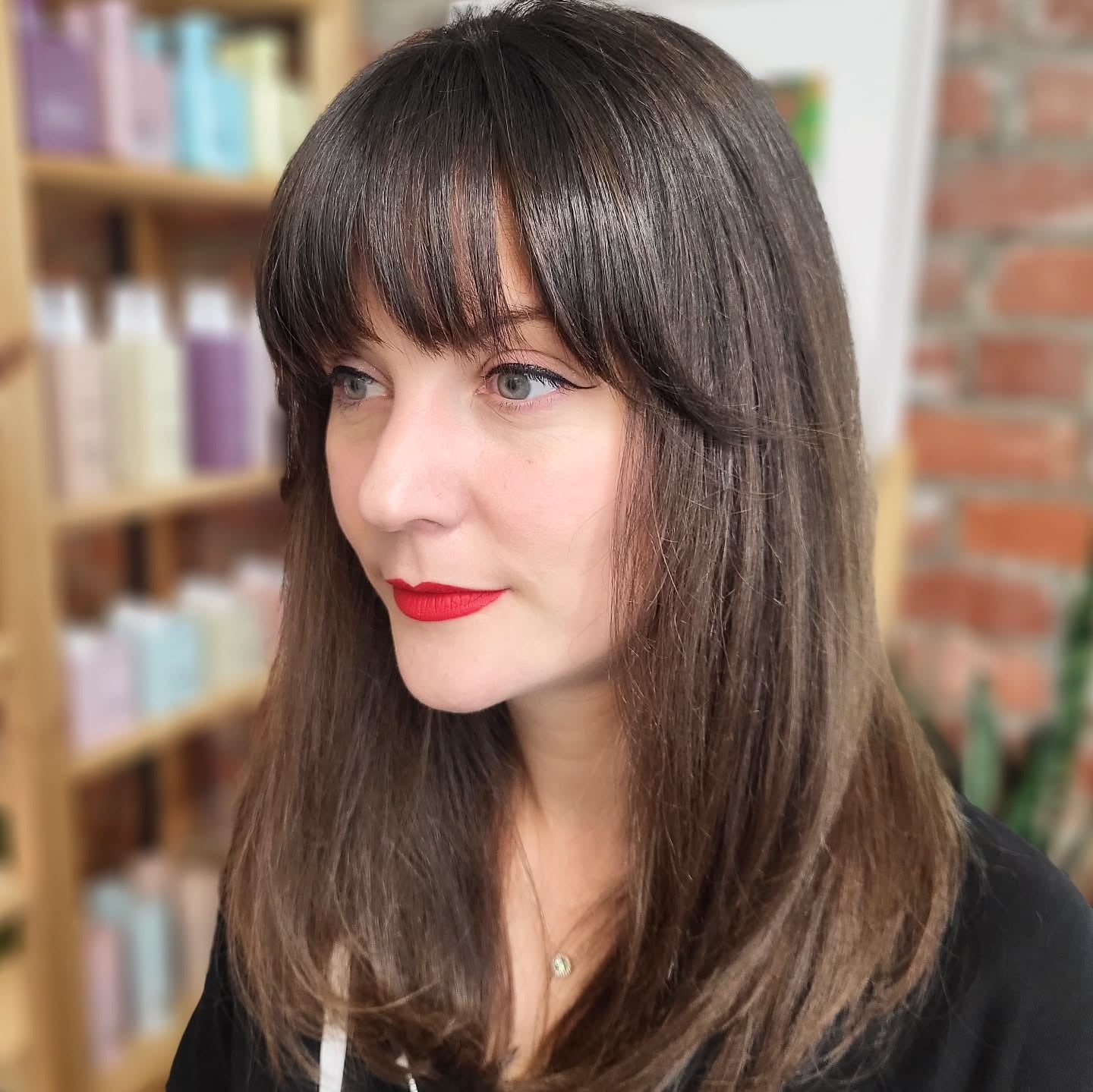 8. Straight Blowout with Full Fringe (Bangs Hairstyles)