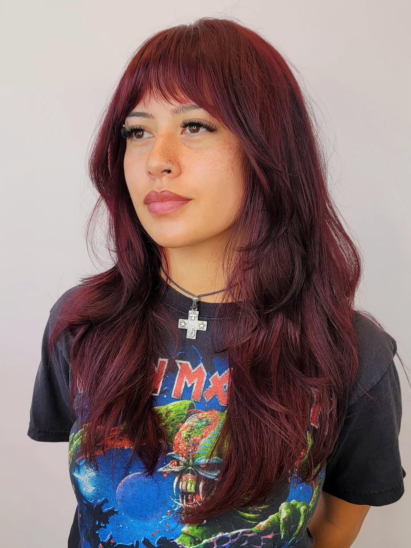 10. Layered Merlot Cut with Textured Bangs (Bangs Hairstyles)