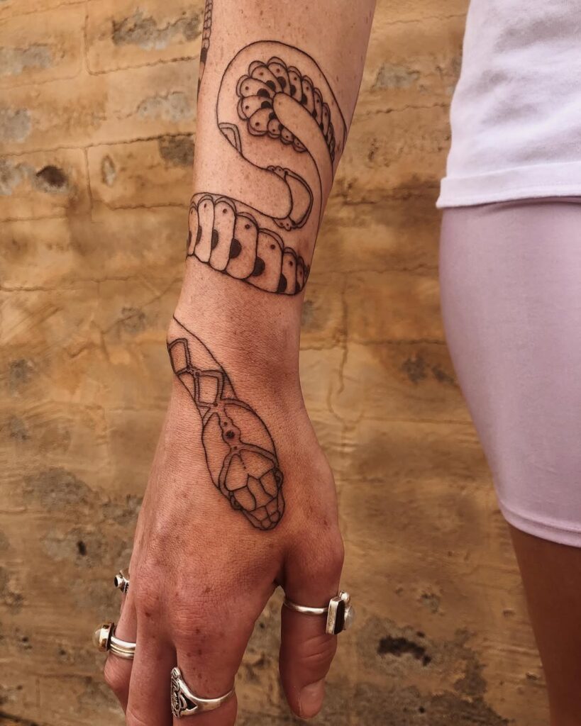 Brown Ink Snake Tattoo