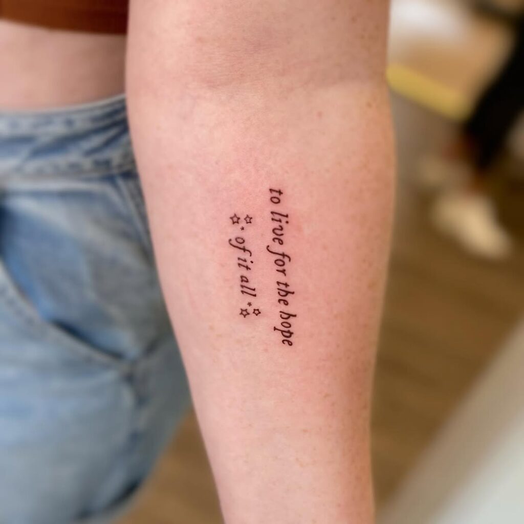 Brown Ink Quote Tattoo