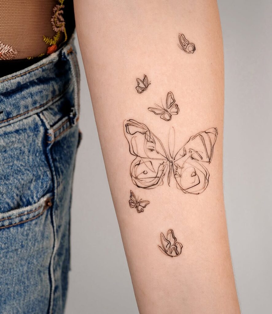 Brown Ink Butterfly Tattoo
