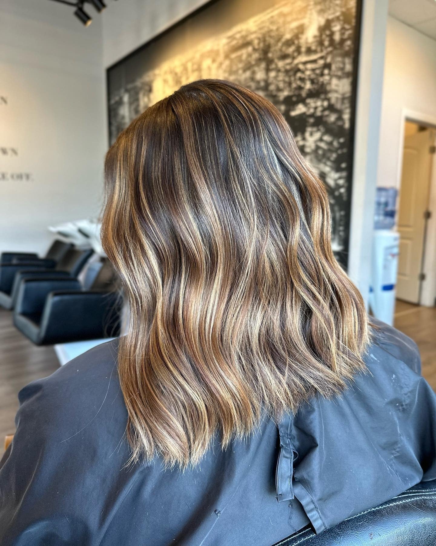 1. Warm Caramel Balayage Waves (Fall Blonde Hair Color)