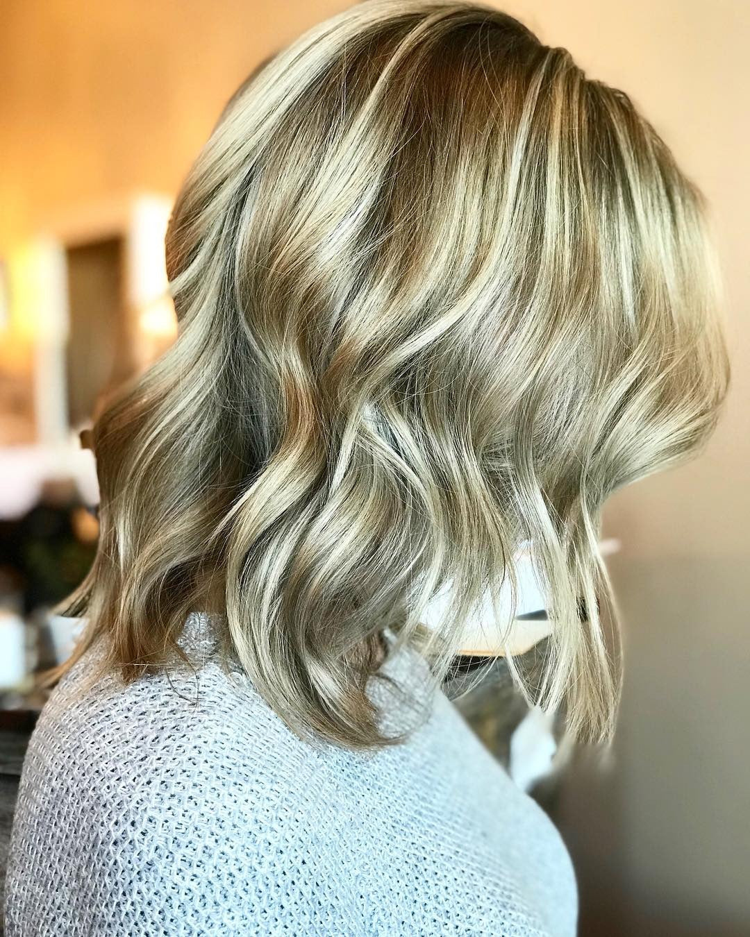 3. Wavy Lob with Dimensional Blonde (Chic-Length Hairstyles)