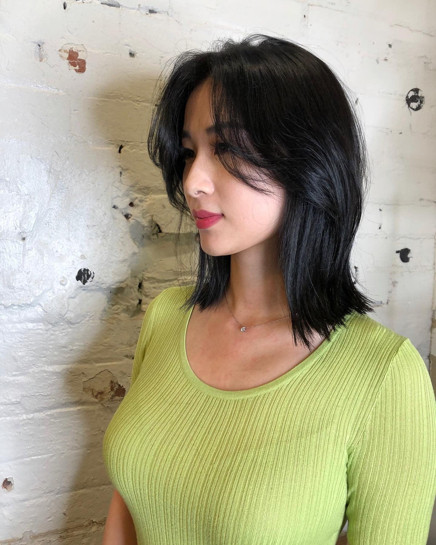 14. Wispy Layered Cut with Face-Framing Bangs (Chic-Length Hairstyles)