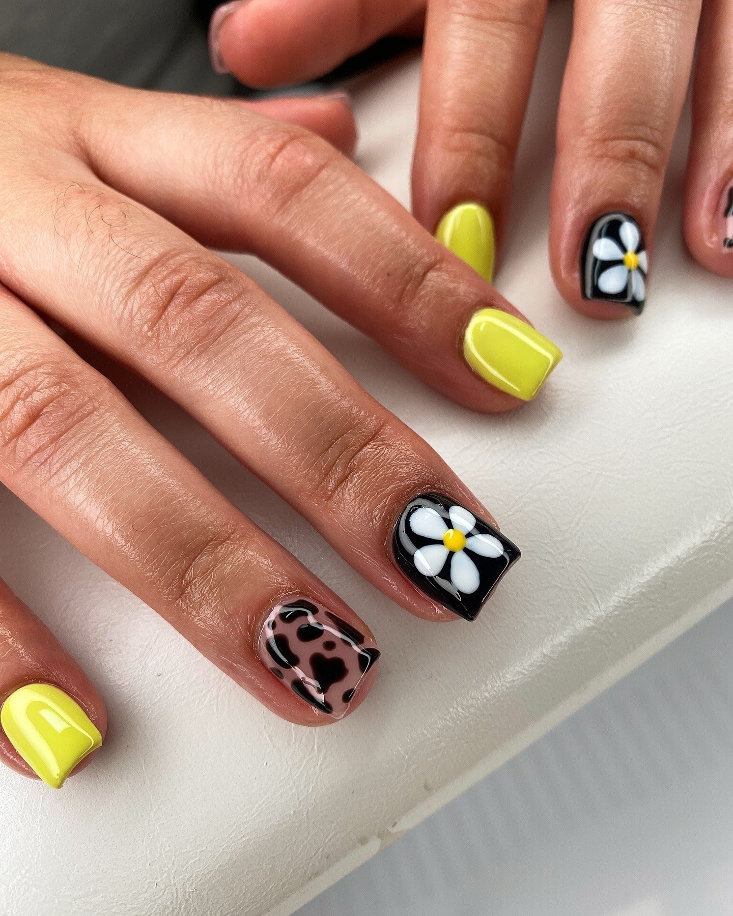 5. Neon Daisy Pop (Cute Short Nail Ideas)