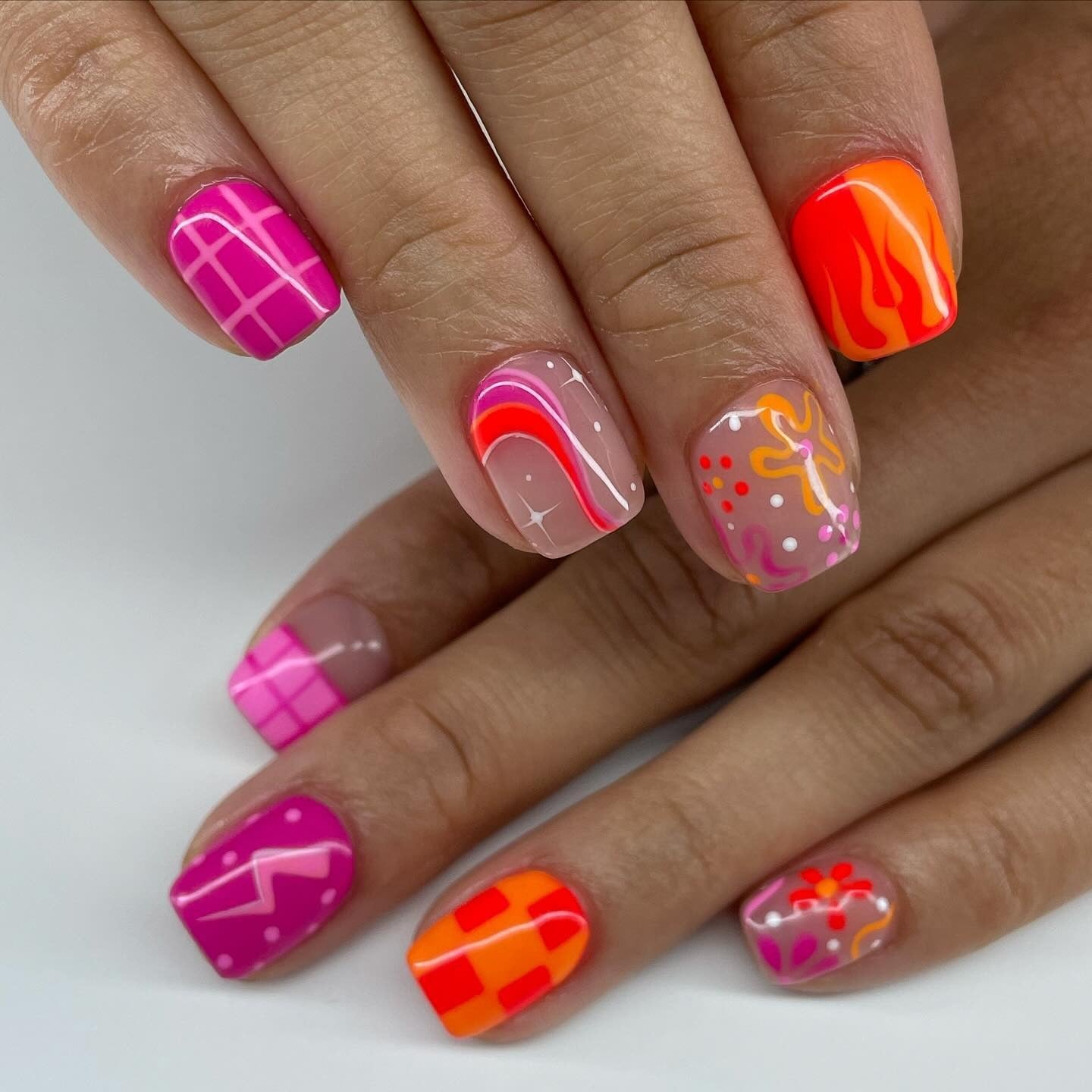 6. Retro Neon Mix (Cute Short Nail Ideas)