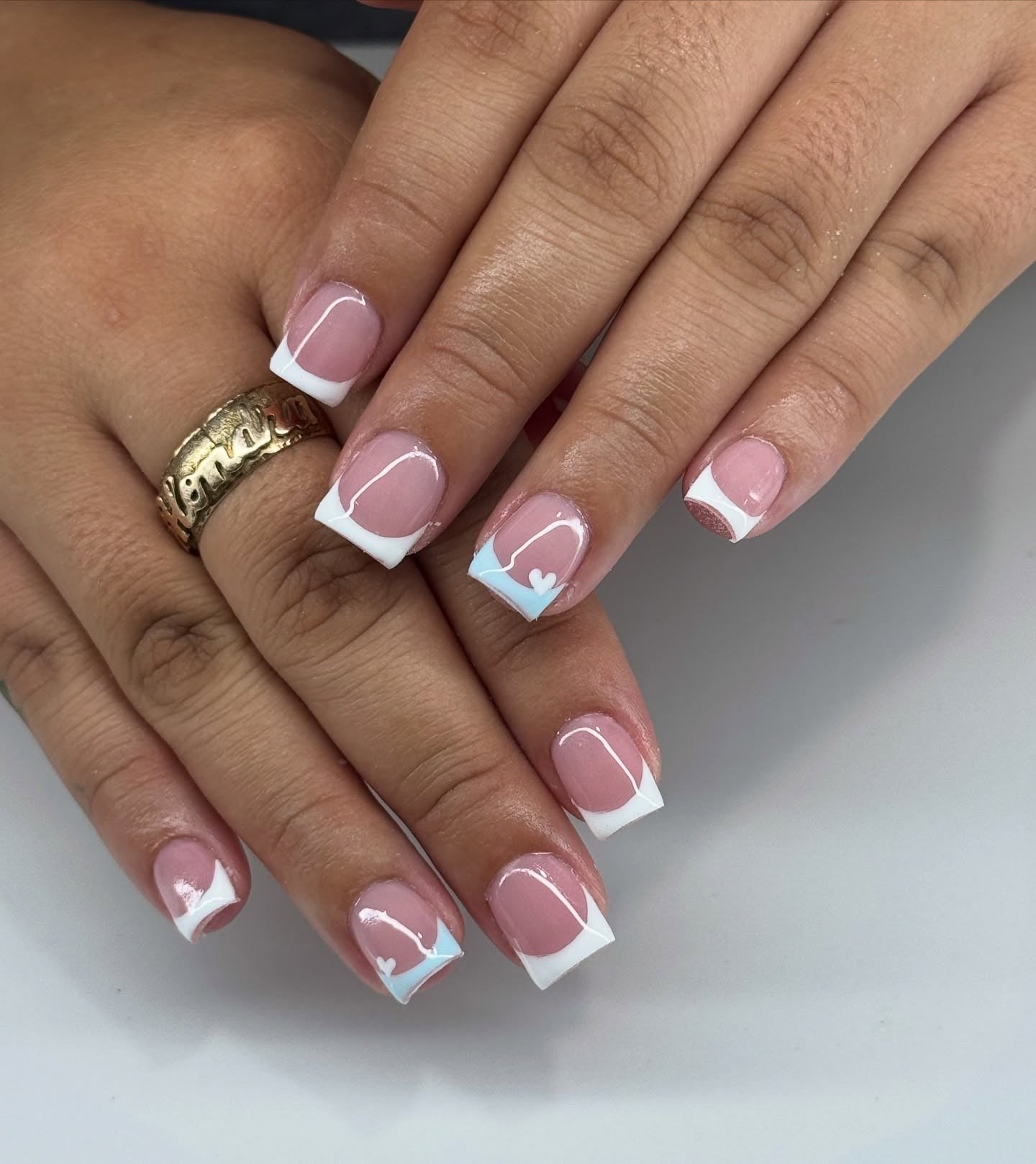12. Modern French with Heart Accents (Cute Short Nail Ideas)