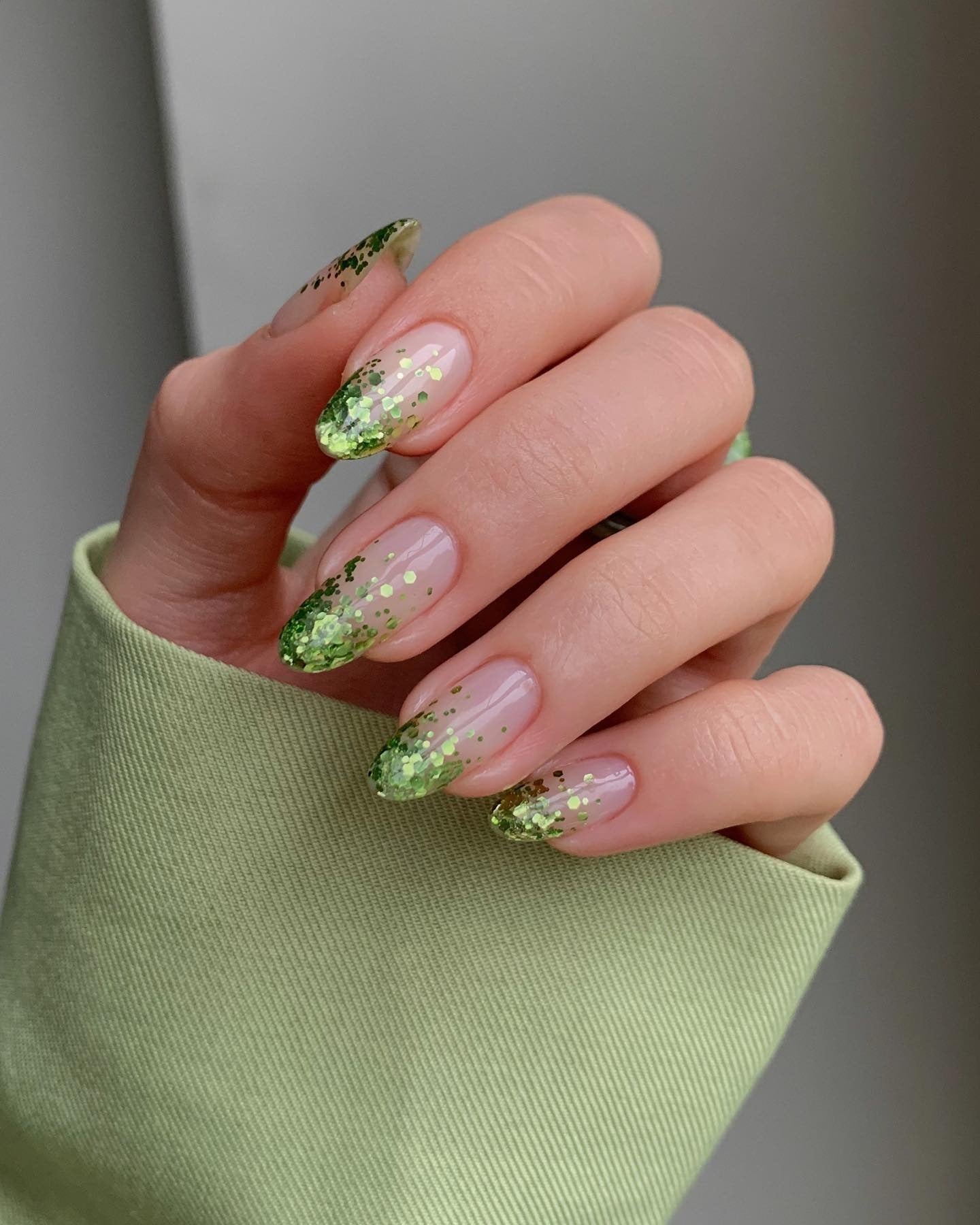 2. Green Glitter Cascade Tips (Glitter Sparkle Nail Ideas)