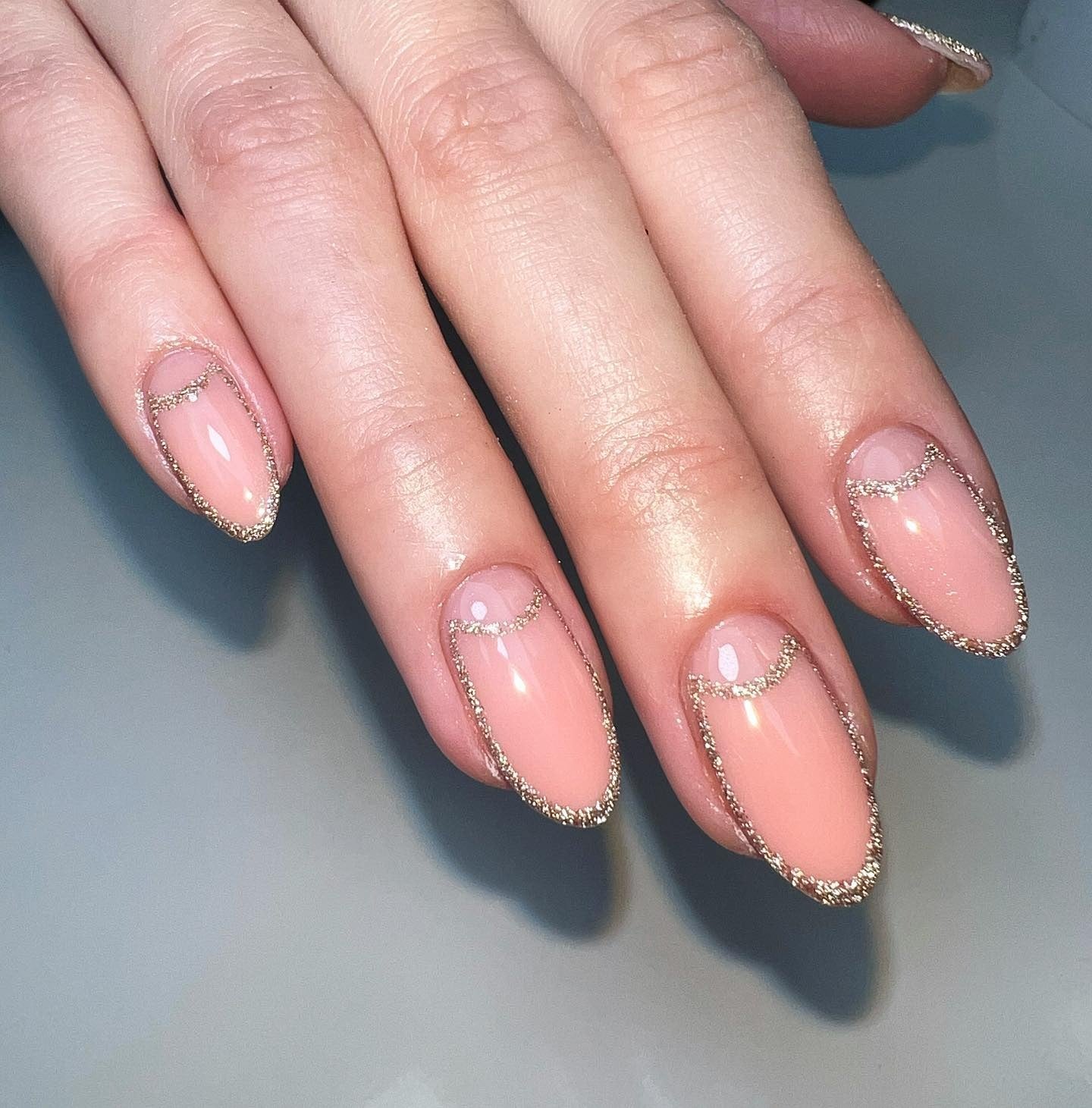 9. Glitter Frame Almond Elegance (Glitter Sparkle Nail Ideas)