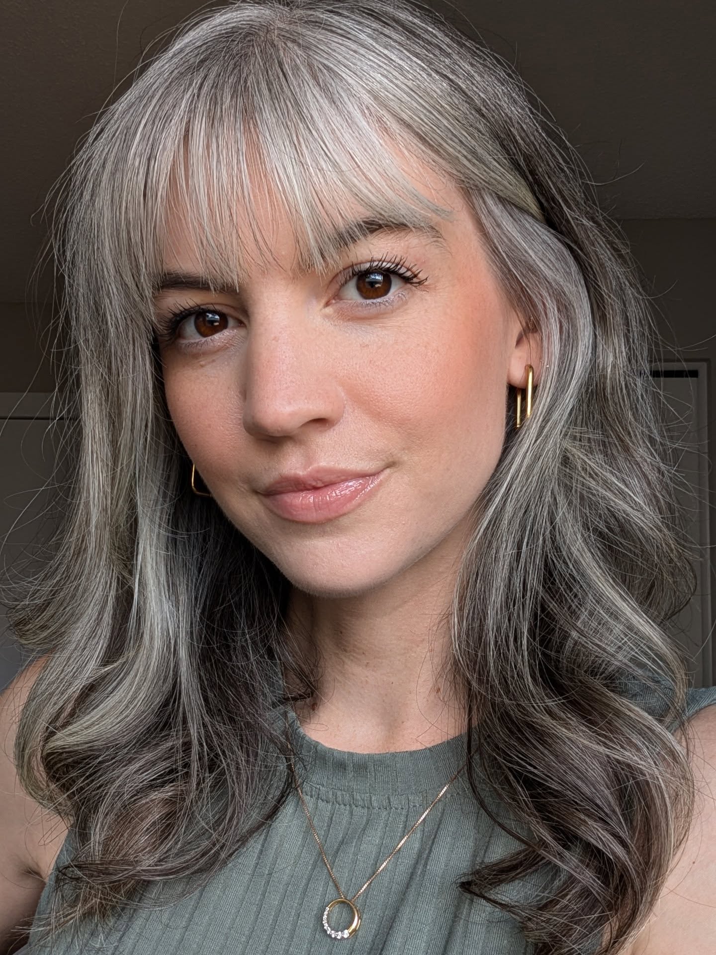 5. Gray Soft Waves with Full Fringe (Gray Hairstyles for Women)