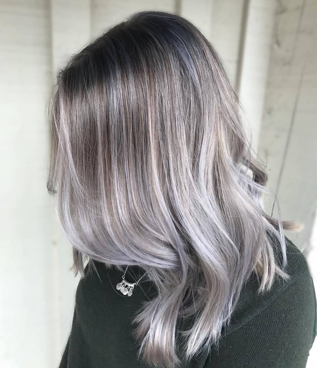 8. Cool-Toned Silver Melt on Mid-Length Hair (Gray Hairstyles for Women)