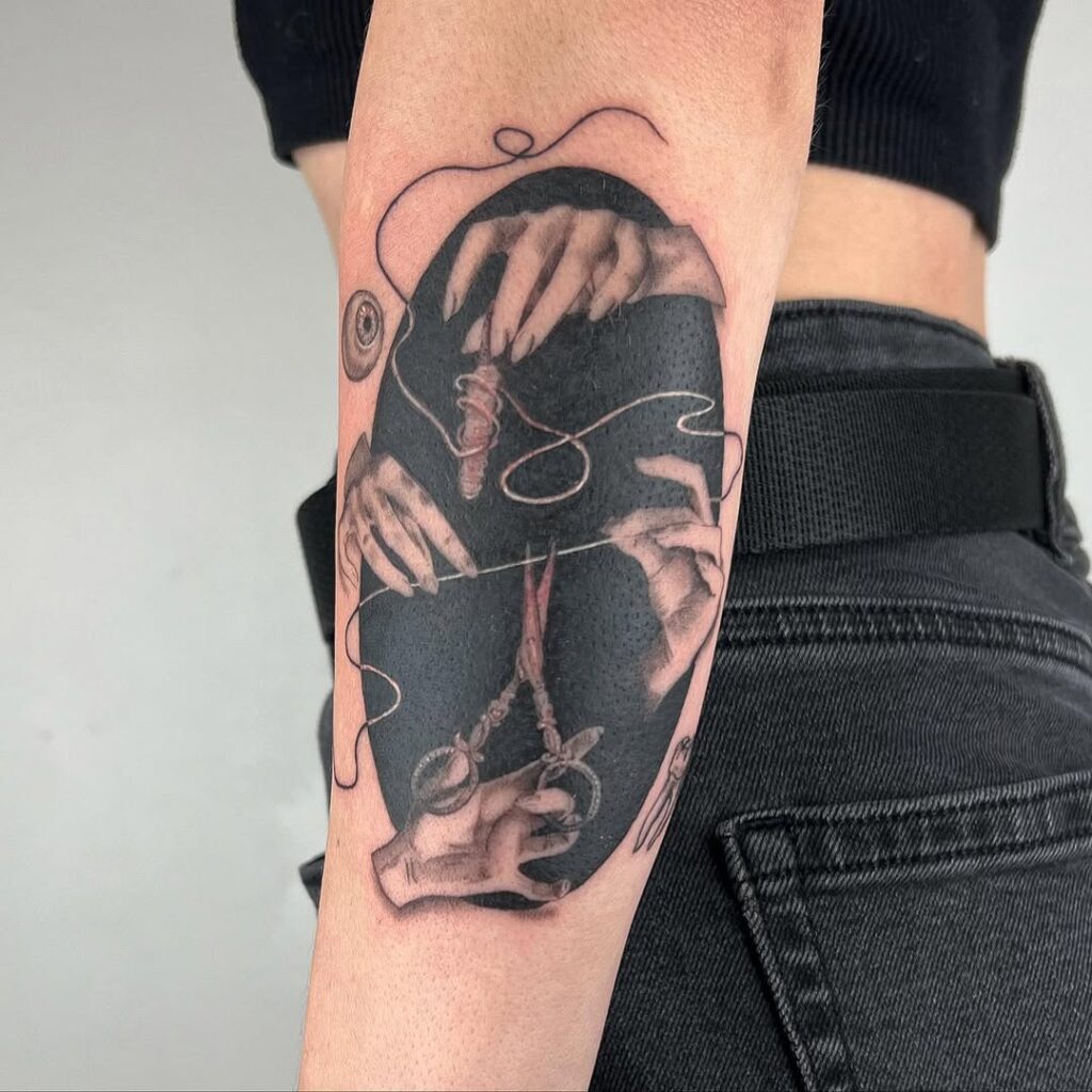 Negative Space Fate Tattoo