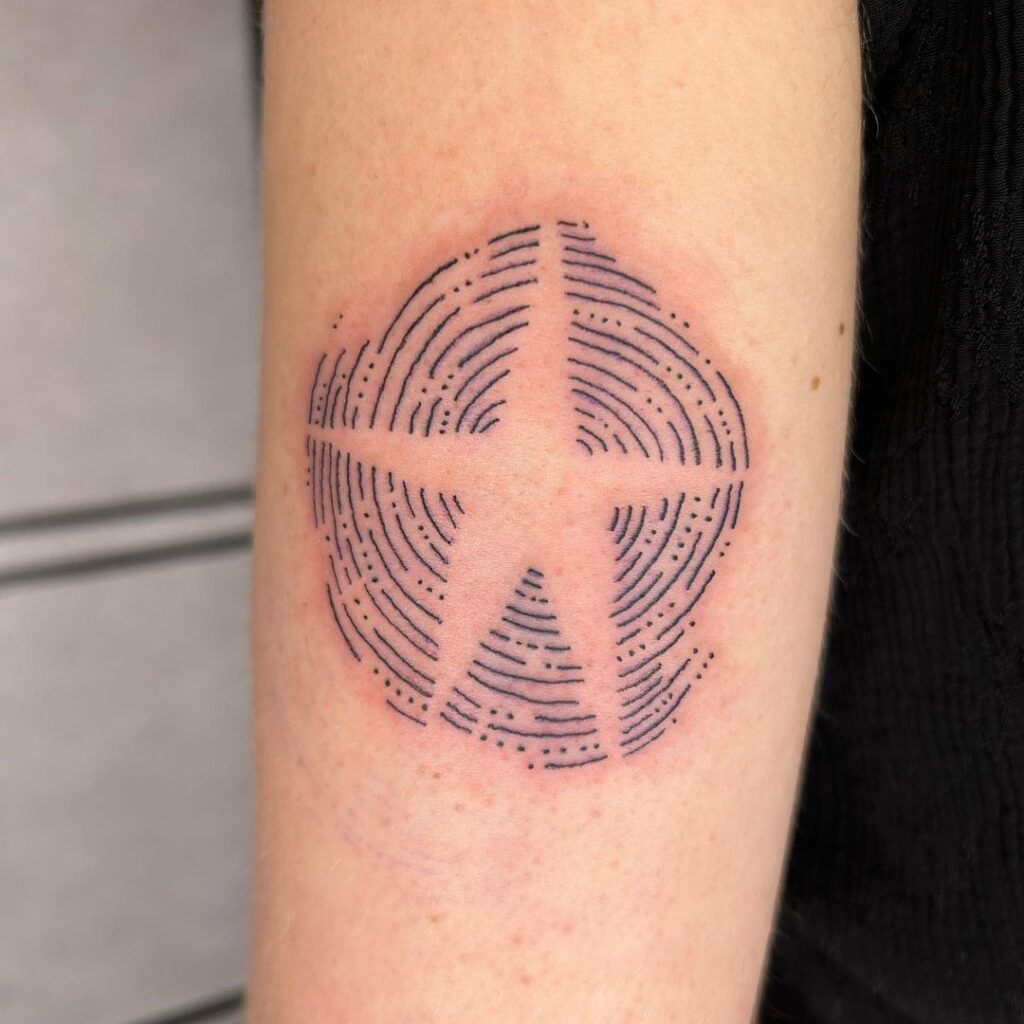 Negative Space Star Tattoo