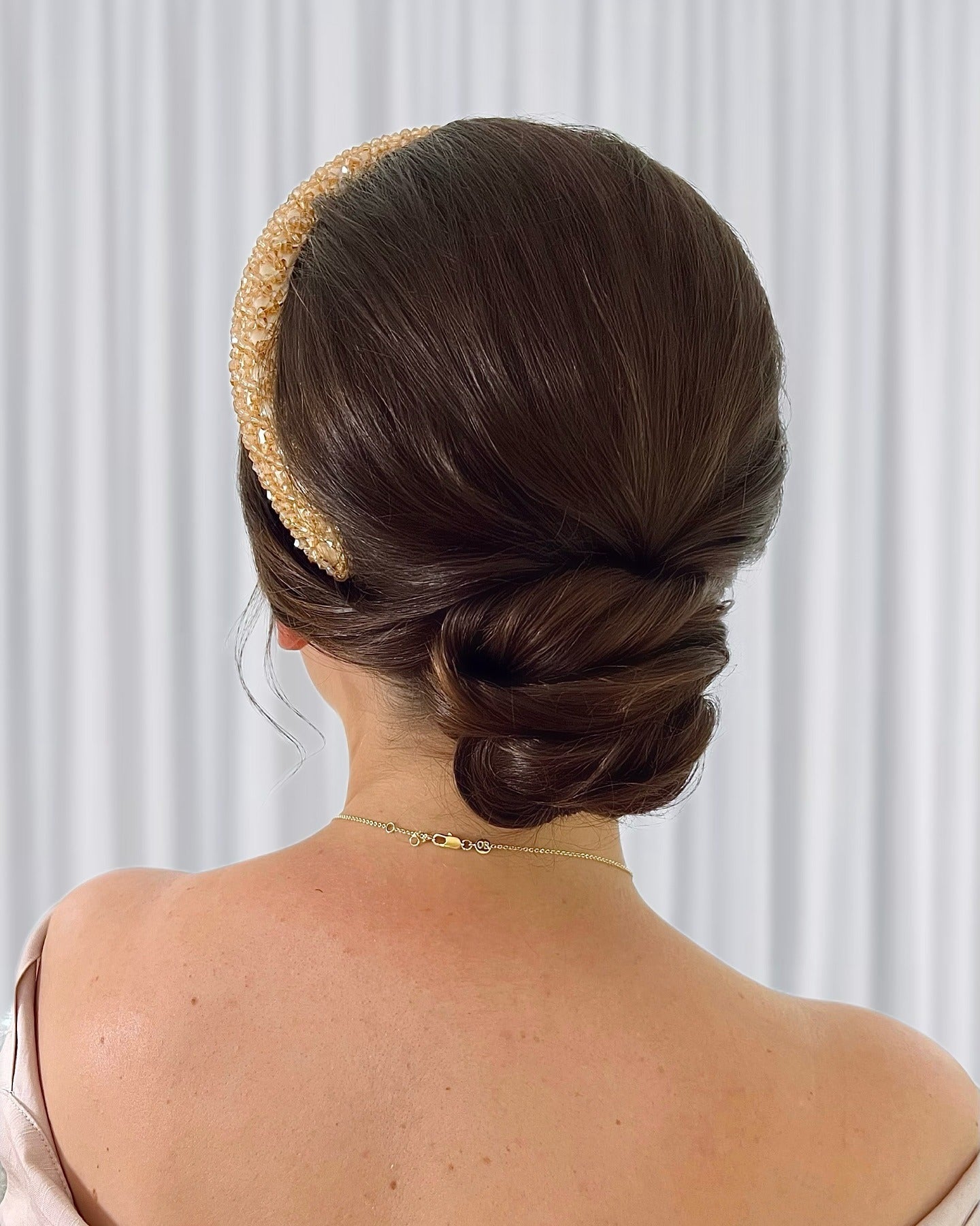 5. Classic Chignon with Pearl Headband Accent (Simple Hairstyles)