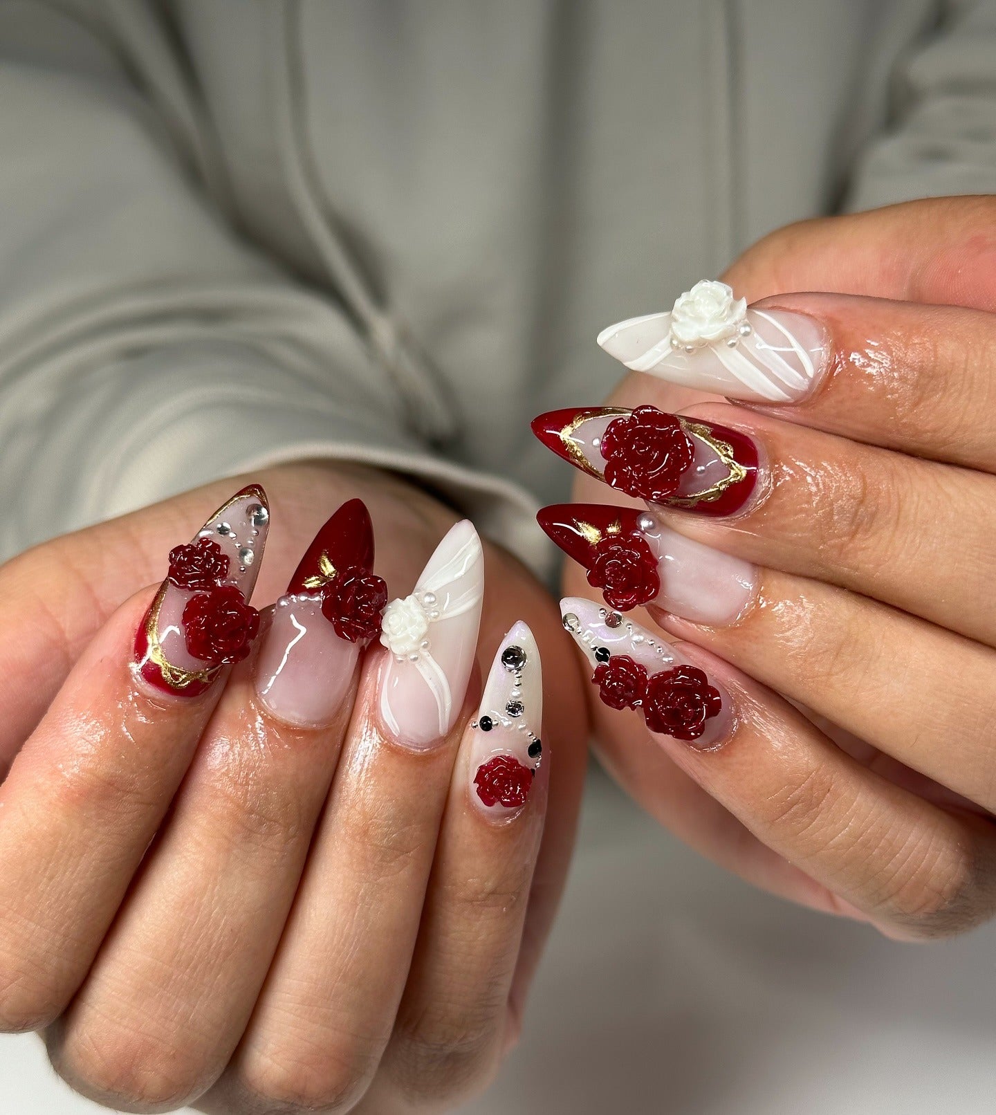 1. 3D Crimson Rose Acrylic Nails (Red Prom Nail Ideas)