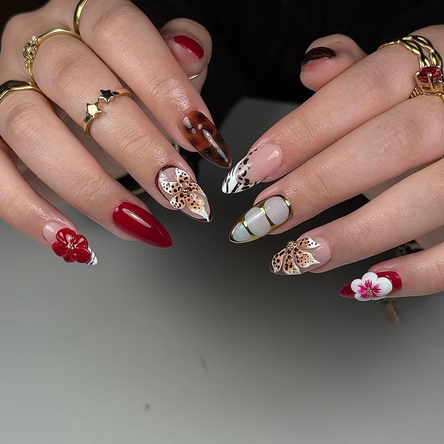 4. Floral and Animal Print Mix Art Nails (Red Prom Nail Ideas)