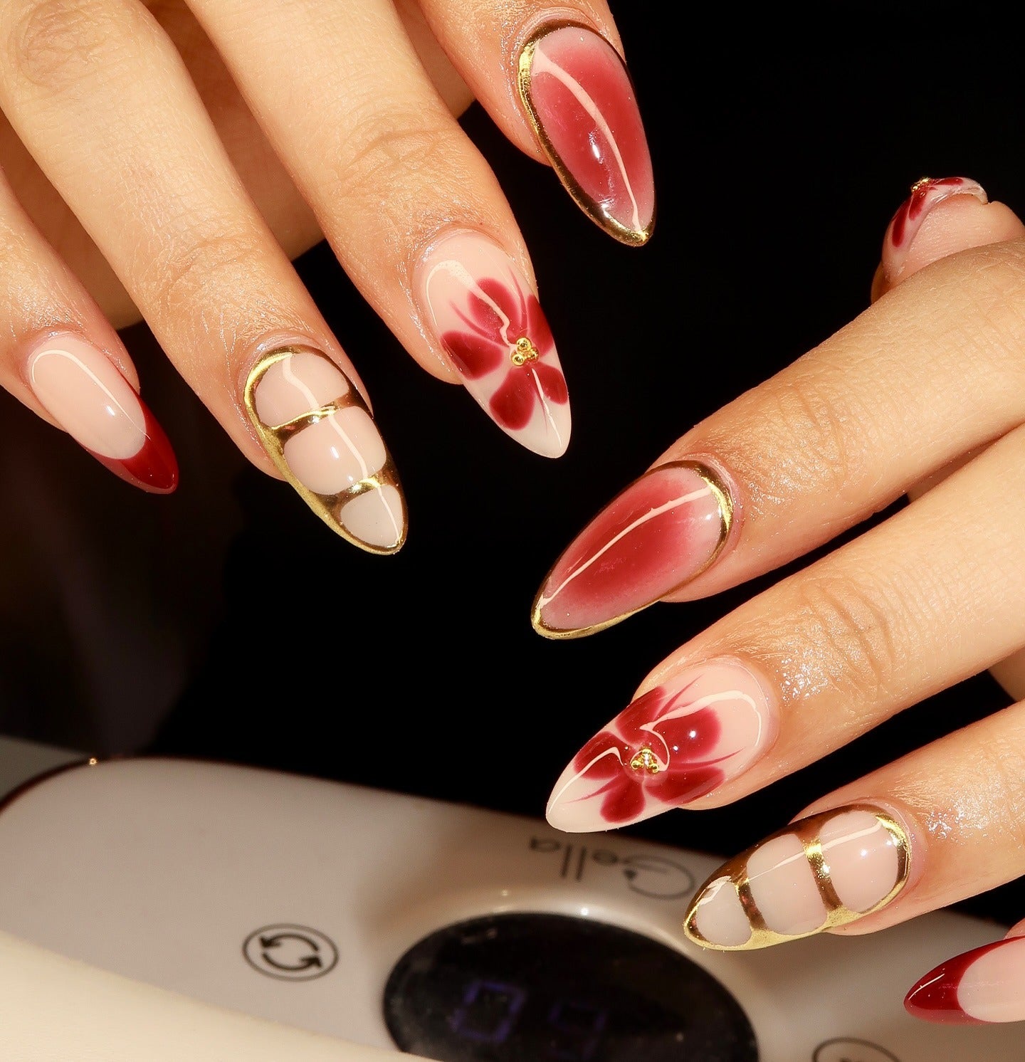 14. Red Floral and Gold Lined Abstract Nails (Red Prom Nail Ideas)