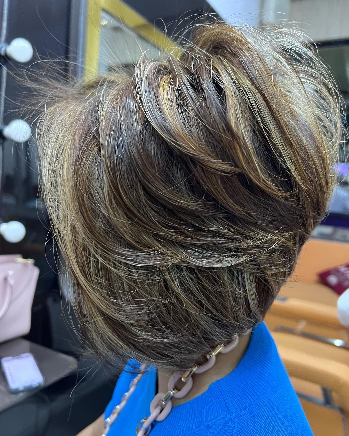 5. Voluminous Layered Bob with Multi-Tonal Highlights (Layered Bob Hairstyles)