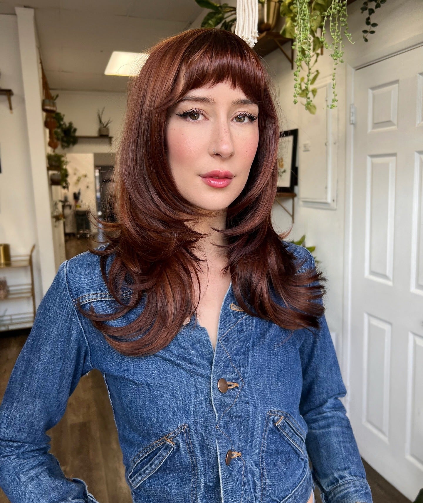 2. Sleek Auburn Layers with Rounded Fringe (Medium Haircuts With Bangs)