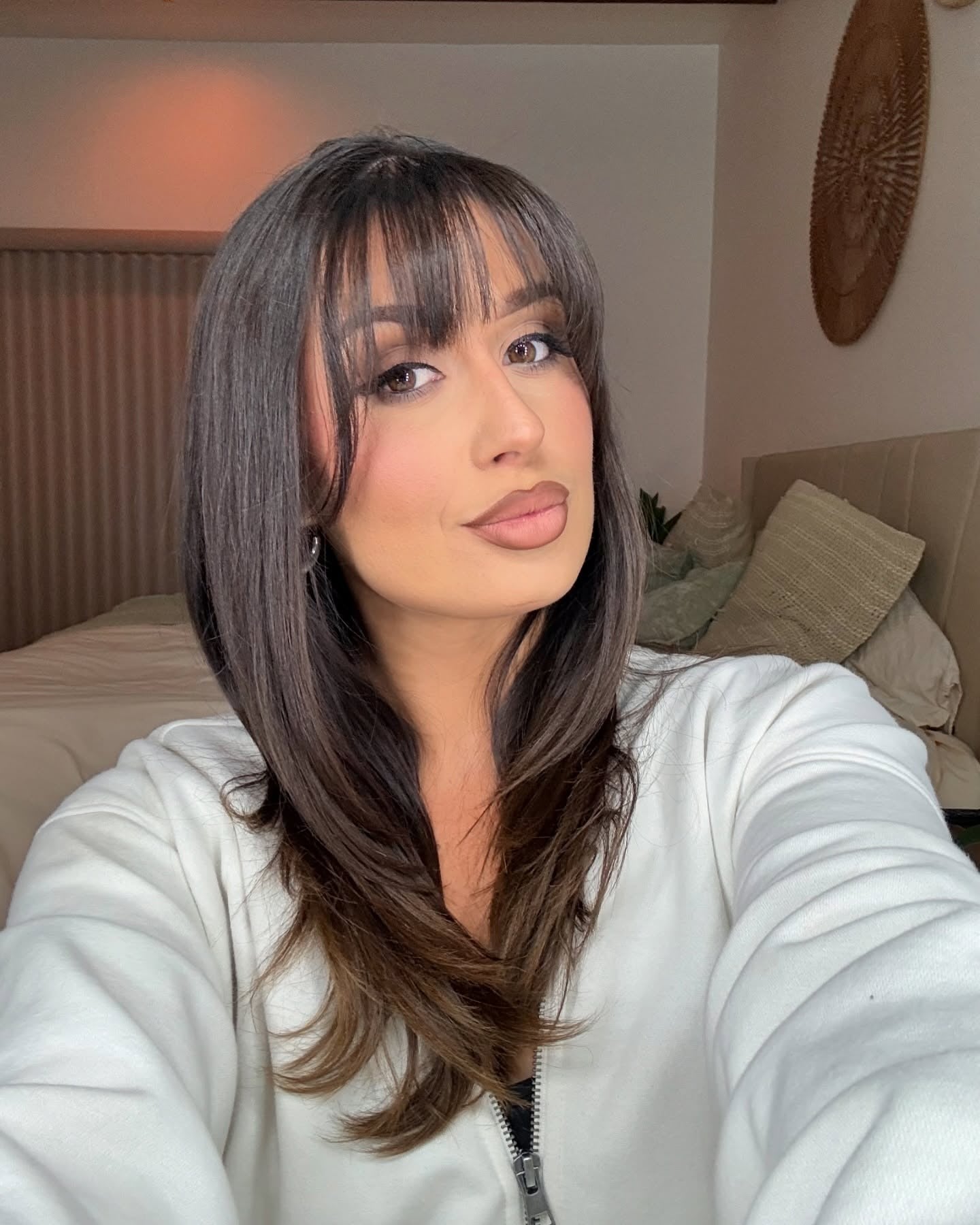 10. Polished Layers with Curtain Bangs (Medium Haircuts With Bangs)