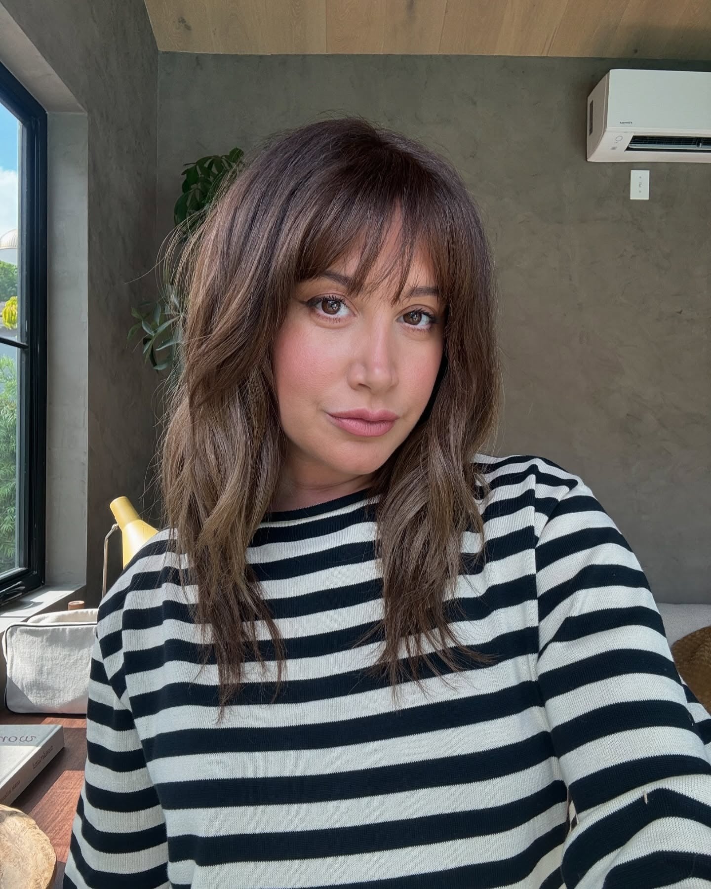 13. Textured Waves with Wispy Fringe (Medium Haircuts With Bangs)