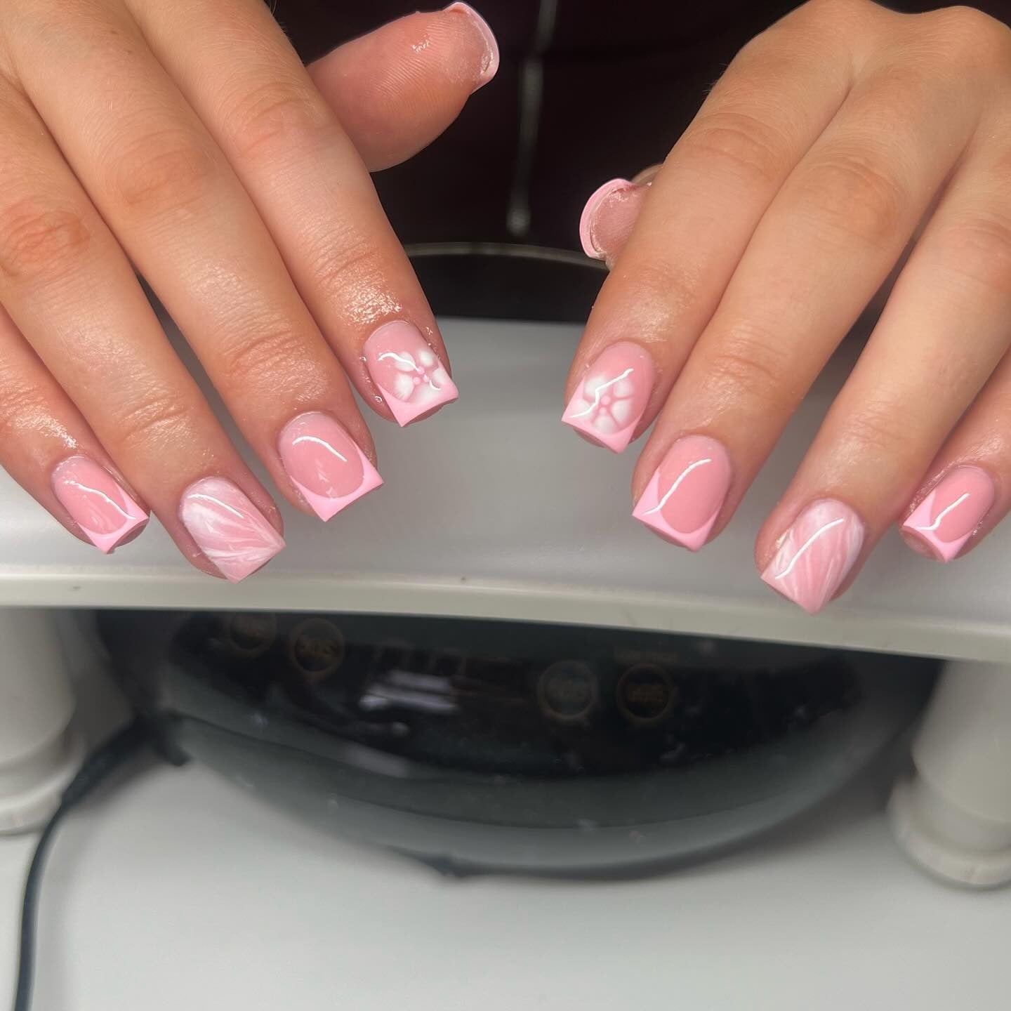 3. Pastel Marble and Petal French Tips (Short Spring Break Nail Ideas)