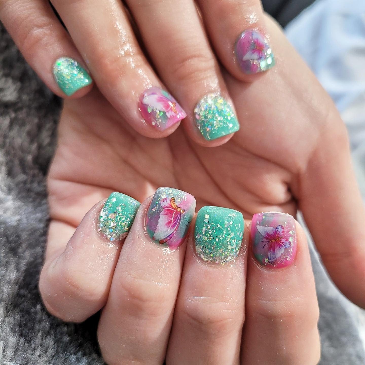 14. Glittered Teal Paradise Nails (Short Spring Break Nail Ideas)