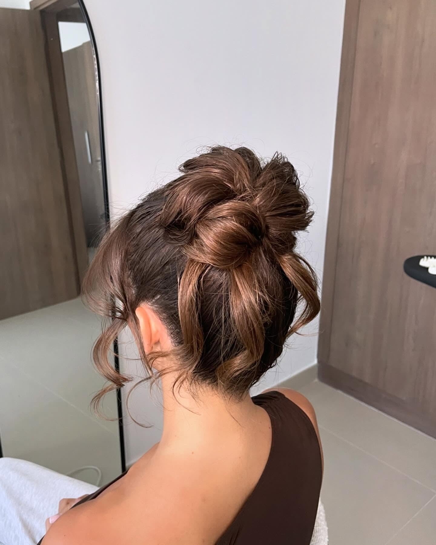 4. Textured Bun with Soft Waves (Simple Hairstyles)