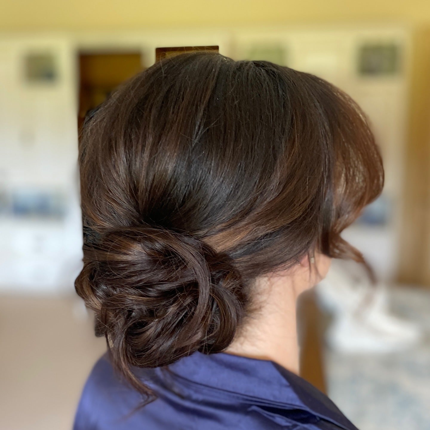 10. Romantic Low Bun with Dark Chocolate Brown (Simple Hairstyles)